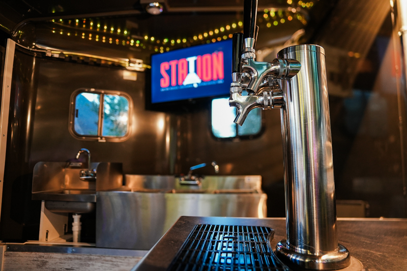 Photo of Draft Beer Taps inside The Station's Tipsy Caboose Mobile Bar